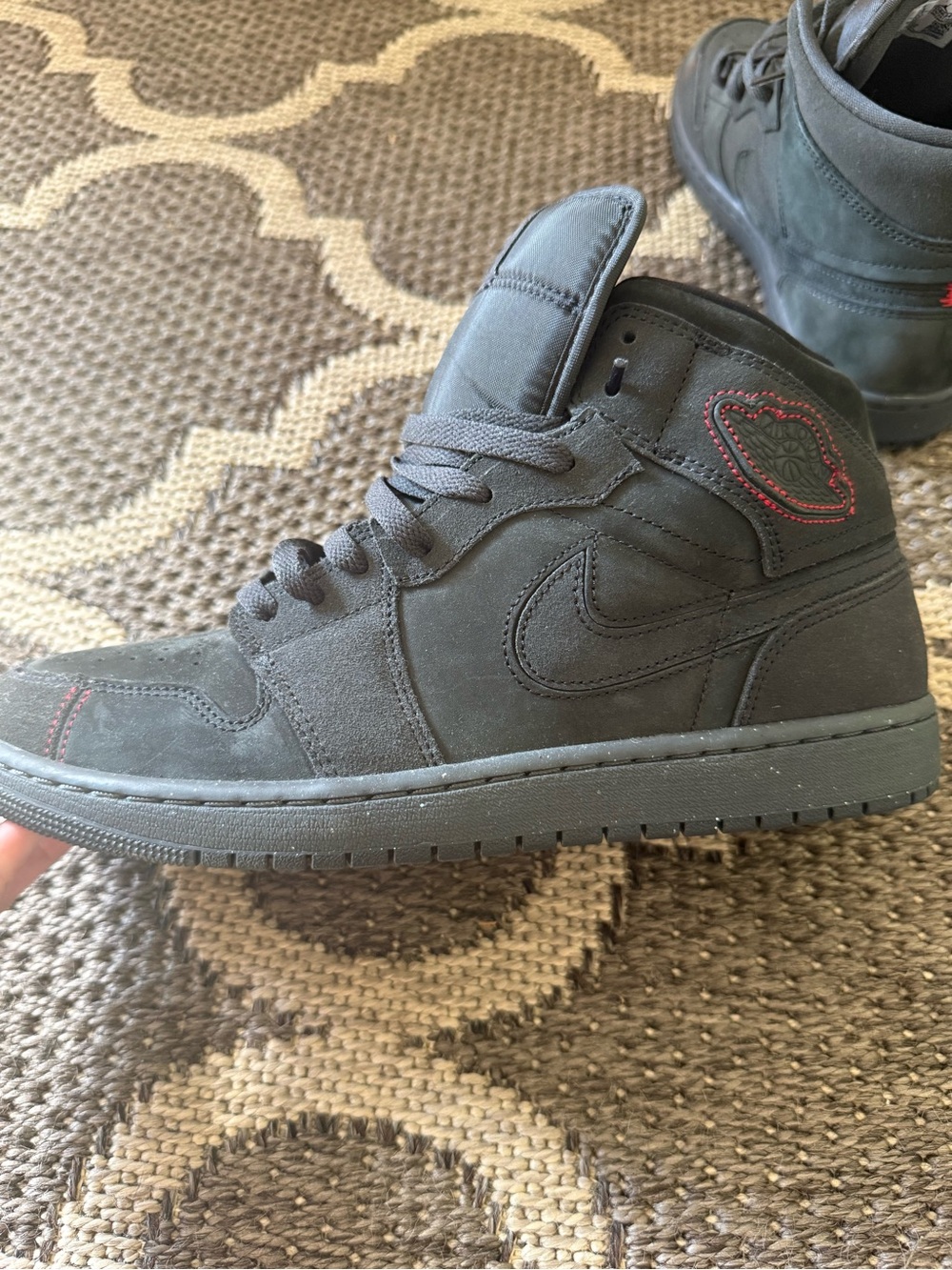 Nike Black High-Top Sneakers with Red Stitch Accents